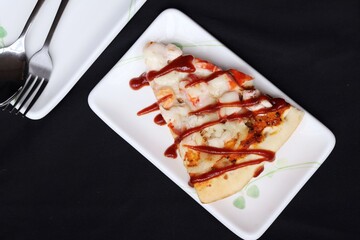Pizza and cheese Italian food on black background