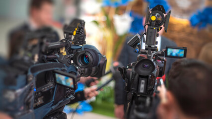 TV camera filming press conferences and interviews