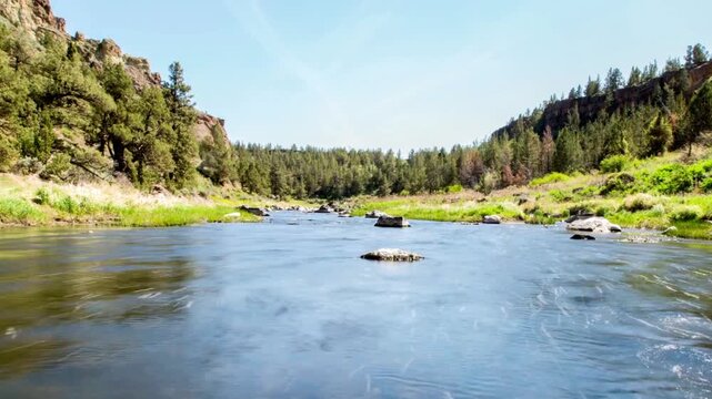 A scenic view of the deschutes river flowing through tumalo state park
