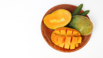 Fresh organic mango with leaves isolated clipping path. Mango macro studio photo