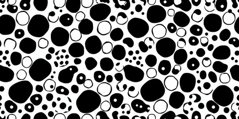 Fototapeta premium Intricate black & white hand-drawn polkadot animal print; seamless pattern, vector, minimalist