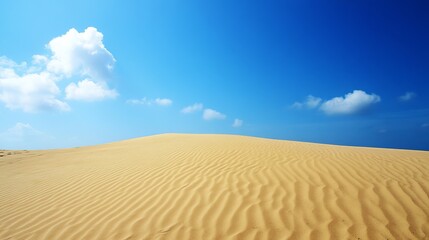 Fototapeta premium Vast golden desert expanse under vibrant blue sky