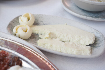 Soft cheese dish served with delicate butter swirls