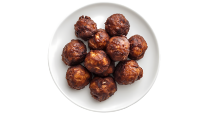 A top view of a white plate filled with golden brown fried dough balls isolated on white background
