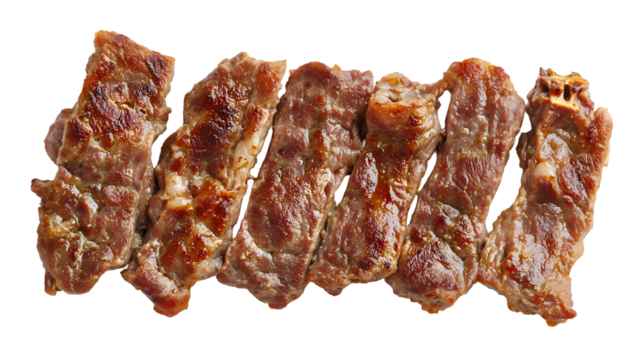 A row of cooked pork ribs isolated on white background