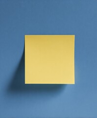Bright yellow sticky note square on smooth blue background for reminders notes or organizational planning with minimal style and flat lay perspective