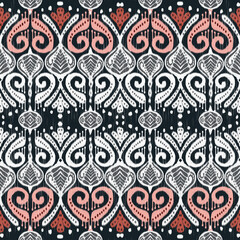 Ikat fabric Multi-colored abstract symbol