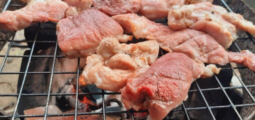 Pork grilled on a charcoal grill