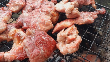 Pork grilled on a charcoal grill