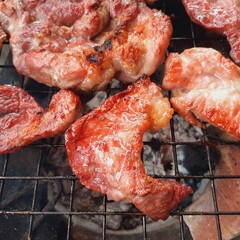 Pork grilled on a charcoal grill