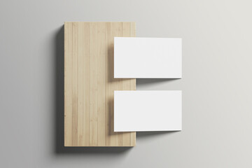 Business card mockup on a wooden background