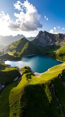 Alpine lake nestled in a valley of green hills under a bright sky