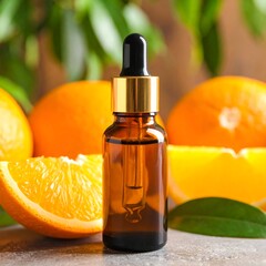 Amber bottle of citrus essence surrounded by oranges