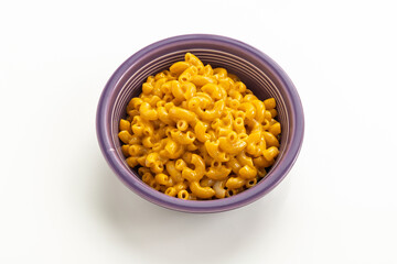 Creamy Macaroni and Cheese Served in a Purple Bowl on White Background
