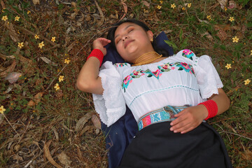 Young woman resting peacefully in natural setting