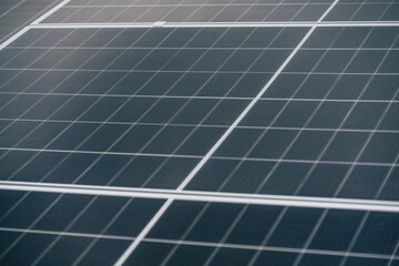 Solar panels installed on a roof capture sunlight for renewable energy generation in an urban...