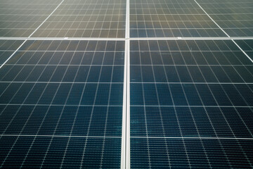 Solar panels installed on a rooftop in a sunny location showcase renewable energy technology for...
