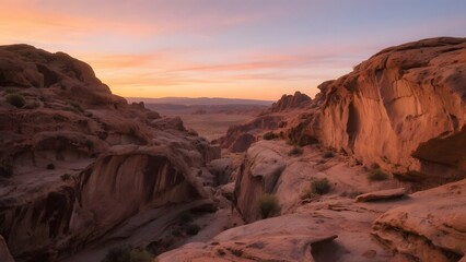 Sunset Over Sandstone Formations in a Desert Landscape