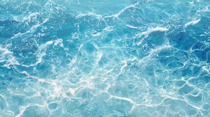 Obraz premium Crystal clear water reflects sunlight, producing a mesmerizing display of blues and whites. Gentle waves create soothing ripples, enhancing the tranquil atmosphere of this tropical paradise.