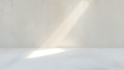 光が差し込むシンプルでクリーンな壁と床の背景