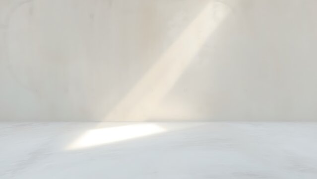 光が差し込むシンプルでクリーンな壁と床の背景