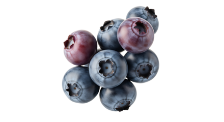 Stacked blueberries with varied hues of blue and reddishpurple showcasing their natural texture.