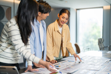 Crm software and customer management system team of asian business professionals analyzing data...