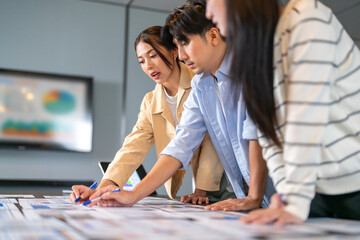 Crm software and customer management system team of asian business professionals analyzing data...