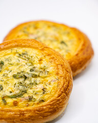 Golden, flaky mini quiche pastries with rich egg and herb filling. Perfect for brunch menus,...