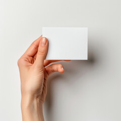 Obraz premium hand holding white card on white background