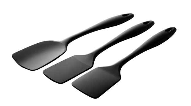 Three black silicone spatulas arranged in a slightly overlapping, diagonal row