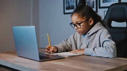 Dedicated Teen Student: Writing and Researching at Home