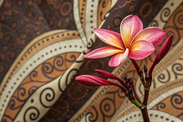 Closeup flower on batik sarong pattern background in Thailand