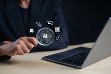 A person in a dark outfit holds a magnifying glass over an AI circuit symbol near a laptop,...