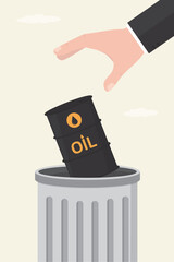 Hand of businessman or customer throw oil barrel in trash can. Economic and trade wars. Ban on import oil, gas. Sanctions or restrictions. Commodities market crisis.