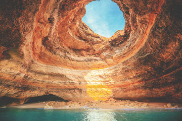 Coastal rocky seascape, view inside the cave Benagil in Algarve region in the Atlantic Ocean, Portugal, Europe