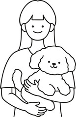 A woman holding a dog