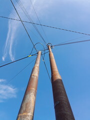 low angle view of electric pole with natural sky background