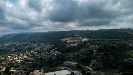 Aerial View of Scenic Italian Countryside with Dramatic Cloudy Sky