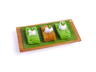 Getuk on wooden plate. Getuk is a traditional Indonesian snack made from mashed boiled cassava,...