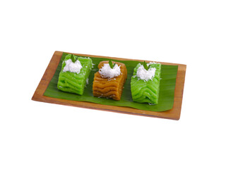Getuk on wooden plate. Getuk is a traditional Indonesian snack made from mashed boiled cassava,...