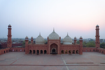 Expansive view of the Badshahi Mosque in Lahore, Pakistan, highlighting its vast courtyard and...