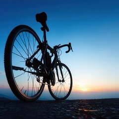 Fototapeta premium Silhouette of a bicycle at sunset.