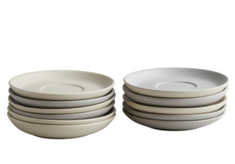 Sets of six minimalist ceramic plates with subtle speckled finish, arranged in perfect stacks on black background, elegant tableware for salads, desserts, or appetizers in modern dining