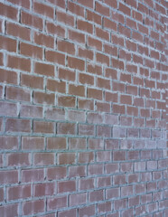a brick wall goes high into the sky