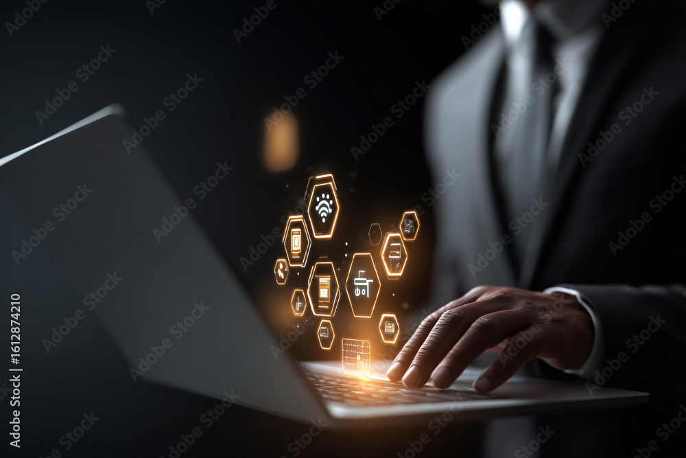 Poster a businessman using a laptop with a network of glowing digital icons and data emanating from the dis