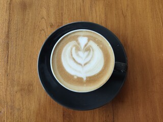 A perfect cup of coffee with heart latte art