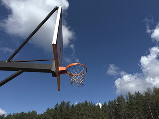 Low Angle View of Outdoor Basketball Hoop with Net against Blue Sky and Clouds on a Sunny Day