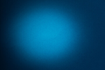 一部に光が当たった青色の背景