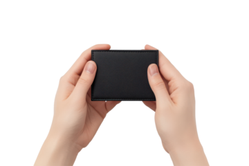 Hands holding a textured black wallet isolated on transparent background. Empty black wallet in male hands isolated on white background.